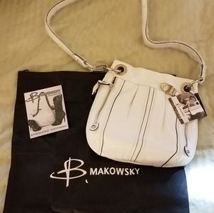 B. Makowsky white cross body leather bag